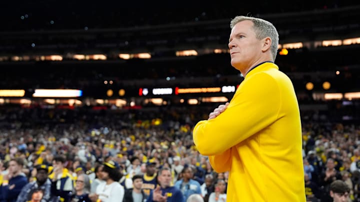 Michigan head coach Dusty May looks on from the court ahead of the NCAA National Championship game against Connecticut at Lucas Oil Stadium in Indianapolis on Monday, April 6, 2026.