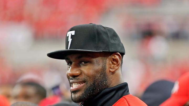 LeBron James takes in the warmups of the Virginia Tech Hokies and Ohio State Buckeyes game in Ohio Stadium on September 6, 2014. LeBron James takes in the warmups of the Virginia Tech Hokies and Ohio State Buckeyes game in Ohio Stadium on September 6, 2014.