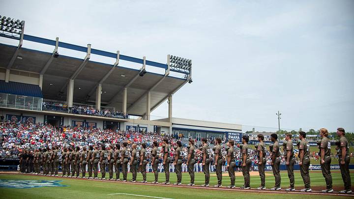 Players line up for the National Anthem as Ole Miss Rebels take on Vanderbilt Commodores during the SEC baseball tournament championship game at Hoover Met in Birmingham, Ala., on Sunday, May 25, 2025. Players line up for the National Anthem as Ole Miss Rebels take on Vanderbilt Commodores during the SEC baseball tournament championship game at Hoover Met in Birmingham, Ala., on Sunday, May 25, 2025.