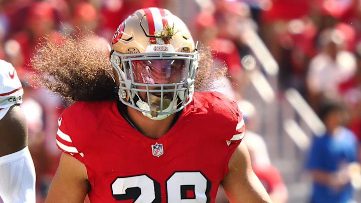 Oct 6, 2024; Santa Clara, California, USA; San Francisco 49ers safety Talanoa Hufanga (29) with grass in his helmet after a play against the Arizona Cardinals during the first quarter at Levi's Stadium. Mandatory Credit: Kelley L Cox-Imagn Images