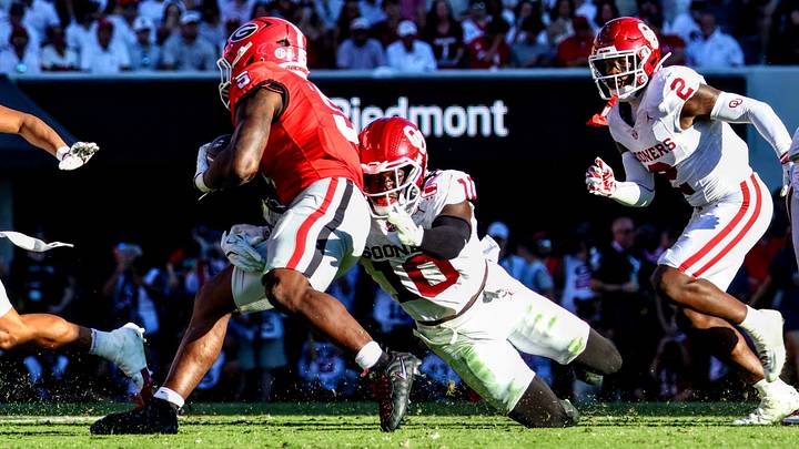Oklahoma linebacker Kip Lewis makes a tackle against Georgia.