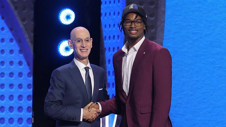 Jun 23, 2026; New York, NY, USA; NBA commissioner Adam Silver greets the ninth pick in the 2026 NBA draft, Michigan forward Morez Johnson Jr. after he was selected by the Dallas Mavericks at Barclays Center. Mandatory Credit: Brad Penner-Imagn Images
