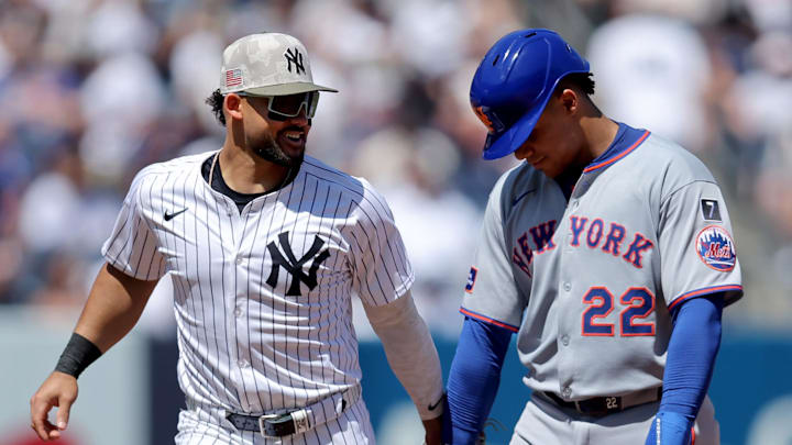 May 17, 2025; Bronx, New York, USA; New York Yankees left fielder Jasson Dominguez (24) shakes hands with New York Mets right fielder Juan Soto (22) after the top of the fifth inning at Yankee Stadium. Mandatory Credit: Brad Penner-Imagn Images