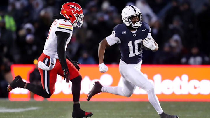 Penn State running back Nicholas Singleton runs with the ball against the Maryland Terrapins during the second quarter at Beaver Stadium. 