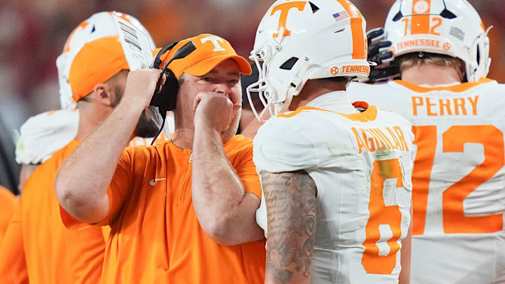 Tennessee coach Josh Heupel talks with Tennessee quarterback Joey Aguilar (6) during a college football game between Tennessee and Alabama at Bryant-Denny Stadium in Tuscaloosa, Ala., on Oct. 18, 2025.
