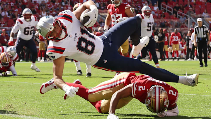 New England Patriots tight end Austin Hooper (81) and San Francisco 49ers cornerback Deommodore Lenoir (8)