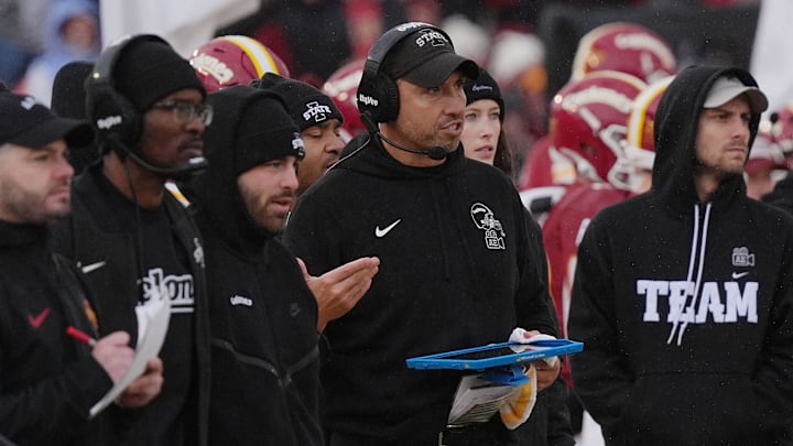Iowa State Cyclones' football head coach Matt Campbell talks to coaching staffs at the sideline against Arizona State during the third quarter in the Big-12 showdown at jack Trice Stadium on Nov. 1, 2025, in Ames, Iowa.