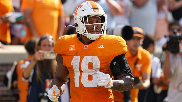 Sep 5, 2026; Knoxville, Tennessee, USA; Tennessee Volunteers running back DeSean Bishop (18) scores a touchdown against the Furman Paladins during the first half at Neyland Stadium. Mandatory Credit: Randy Sartin-Imagn Images Sep 5, 2026; Knoxville, Tennessee, USA; Tennessee Volunteers running back DeSean Bishop (18) scores a touchdown against the Furman Paladins during the first half at Neyland Stadium. Mandatory Credit: Randy Sartin-Imagn Images