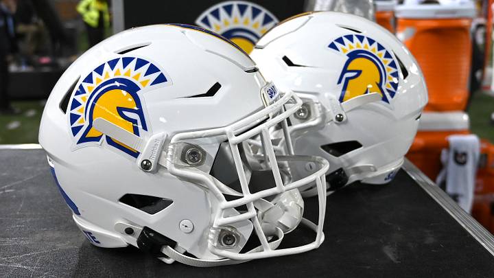 San Jose State Spartans helmets sit on a case during a game against the Washington State Cougars in Pullman in 2024. 
