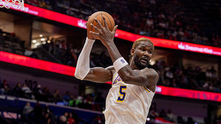 Nov 14, 2025; New Orleans, Louisiana, USA;  Los Angeles Lakers center Deandre Ayton (5) grabs a rebound against the New Orleans Pelicans during the second half at Smoothie King Center. Mandatory Credit: Stephen Lew-Imagn Images