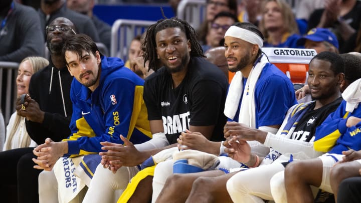 Apr 14, 2024; San Francisco, California, USA; The Golden State Warriors bench watches the closing minutes against the Utah Jazz during the fourth quarter at Chase Center. Mandatory Credit: D. Ross Cameron-USA TODAY Sports
