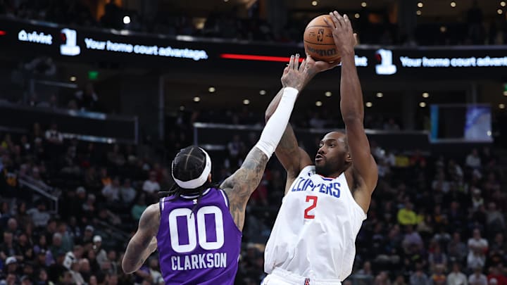 Los Angeles Clippers forward Kawhi Leonard (2) shoots over Utah Jazz guard Jordan Clarkson (00) during the fourth quarter at Delta Center. Mandatory Credit: Rob Gray-Imagn Images