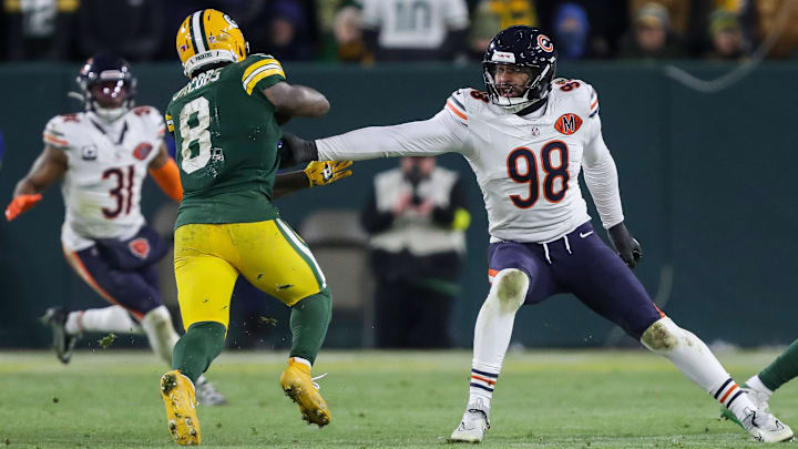 Montez Sweat reaches out in an attempt to stop Packers QB Jordan Love last season.