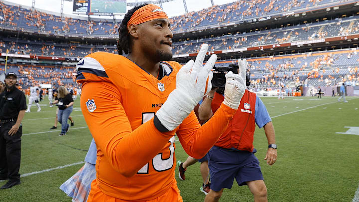 Sep 7, 2025; Denver, Colorado, USA; Denver Broncos linebacker Nik Bonitto (15) reacts after the game at Empower Field at Mile High. 