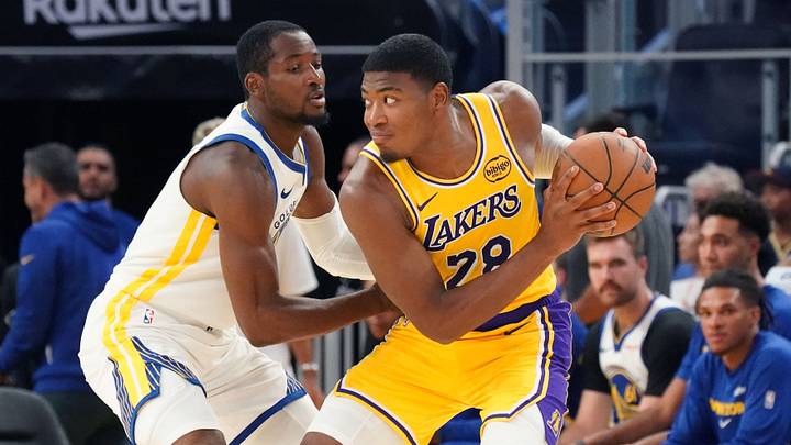 Oct 5, 2025; San Francisco, California, USA;  Los Angeles Lakers forward Rui Hachimura (28) is defended by Golden State Warriors forward Jonathan Kuminga (1) in the third quarter at Chase Center. Mandatory Credit: David Gonzales-Imagn Images
