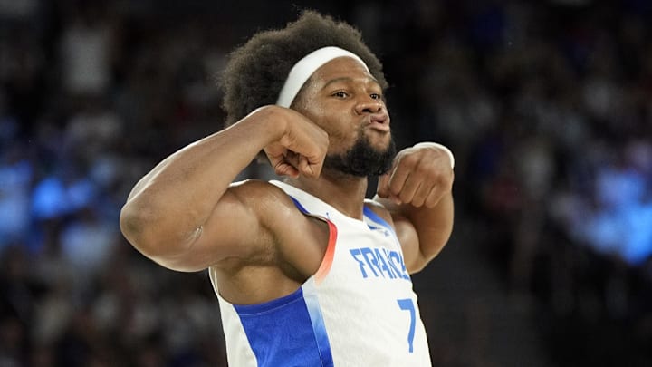Aug 6, 2024; Paris, France; France power forward Guerschon Yabusele (7) reacts in the third quarter against Canada in a men’s basketball quarterfinal game during the Paris 2024 Olympic Summer Games at Accor Arena. Mandatory Credit: Kyle Terada-Imagn Images
