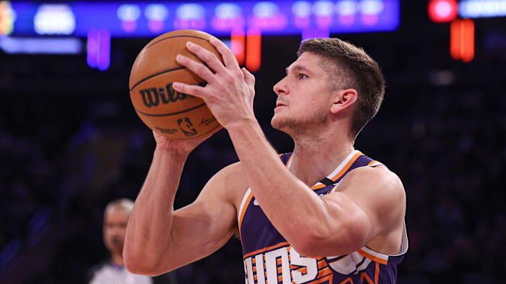 Apr 6, 2025; New York, New York, USA; Phoenix Suns guard Grayson Allen (8) shoots the ball during the first half against the New York Knicks at Madison Square Garden. Mandatory Credit: Vincent Carchietta-Imagn Images