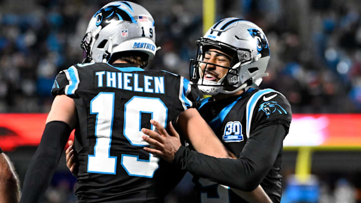 Dec 1, 2024; Charlotte, North Carolina, USA; Carolina Panthers wide receiver Adam Thielen (19) celebrates with quarterback Bryce Young (9) after scoring a touchdown with 30 seconds left in the fourth quarter at Bank of America Stadium. Mandatory Credit: Bob Donnan-Imagn Images Dec 1, 2024; Charlotte, North Carolina, USA; Carolina Panthers wide receiver Adam Thielen (19) celebrates with quarterback Bryce Young (9) after scoring a touchdown with 30 seconds left in the fourth quarter at Bank of America Stadium. Mandatory Credit: Bob Donnan-Imagn Images