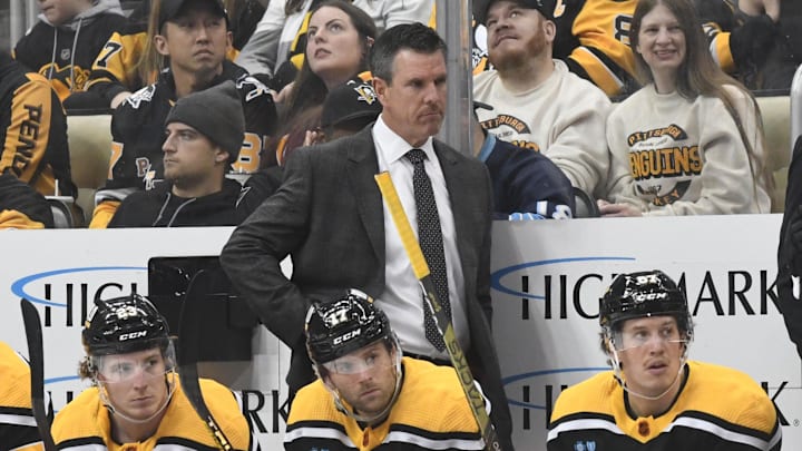 Mike Sullivan behind the Penguins' bench; Mandatory Credit: Philip G. Pavely-Imagn Images
