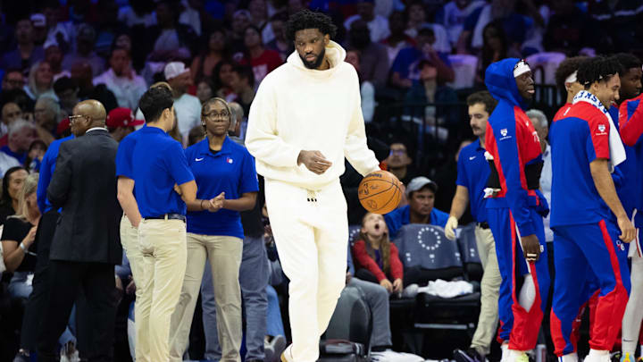 Oct 23, 2024; Philadelphia, Pennsylvania, USA; Philadelphia 76ers center Joel Embiid in plain clothes dribbles the ball during a timeout in the second quarter against the Milwaukee Bucks at Wells Fargo Center. Mandatory Credit: Bill Streicher-Imagn Images Oct 23, 2024; Philadelphia, Pennsylvania, USA; Philadelphia 76ers center Joel Embiid in plain clothes dribbles the ball during a timeout in the second quarter against the Milwaukee Bucks at Wells Fargo Center. Mandatory Credit: Bill Streicher-Imagn Images