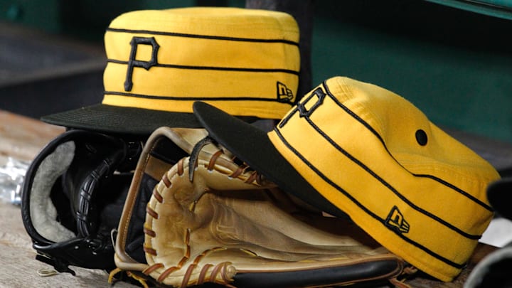 Jul 20, 2019; Pittsburgh, PA, USA;  Pittsburgh Pirates hats and gloves in the dugout against the Philadelphia Phillies during the fifth inning at PNC Park. Pittsburgh won 5-1.