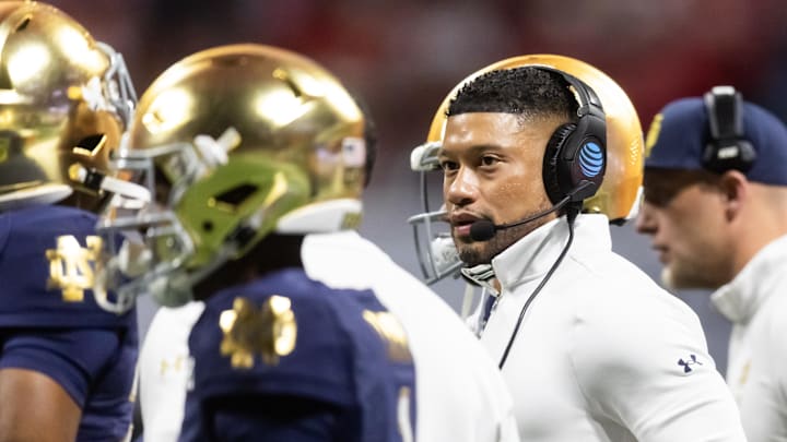 Jan 20, 2025; Atlanta, GA, USA; Notre Dame Fighting Irish head coach Marcus Freeman against the Ohio State Buckeyes during the CFP National Championship college football game at Mercedes-Benz Stadium.