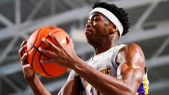 Montverde Academy Eagles guard CJ Ingram (11) goes up for a layup against the Oak Ridge Pioneers in the City of Palms Classic semifinal game at Suncoast Credit Union Arena in Fort Myers on Saturday, Dec. 21, 2024.