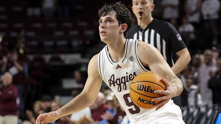 Nov 18, 2025; College Station, Texas, USA;Texas A&M Aggies guard Ruben Dominguez (9) dribbles the ball during the second half against the Montana Grizzlies at Reed Arena. Mandatory Credit: Maria Lysaker-Imagn Images 