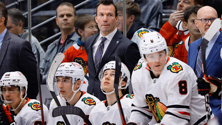 Recently fired Chicago Blackhawks head coach Luke Richardson looks on in the third period against the Colorado Avalanche at Ball Arena.