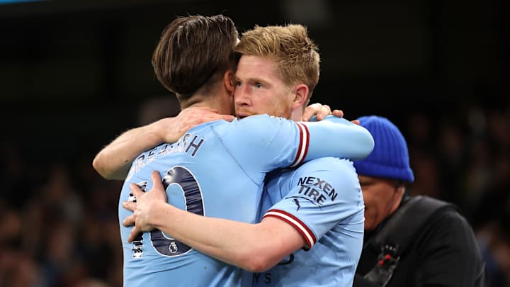 Kevin De Bruyne celebrates with Jack Grealish