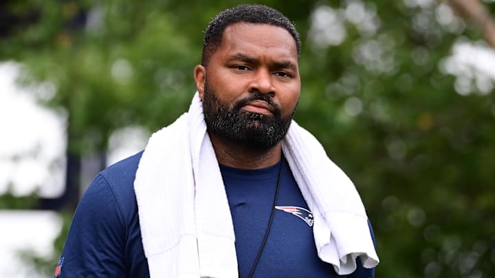 Jul 24, 2024; Foxborough, MA, USA;  New England Patriots head coach Jerod Mayo walks to the podium for a press conference before training camp at Gillette Stadium. Mandatory Credit: Eric Canha-USA TODAY Sports