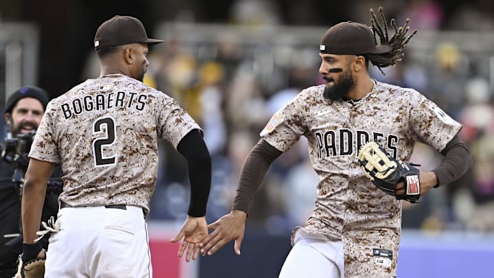 Mar 30, 2025; San Diego, California, USA; San Diego Padres right fielder Fernando Tatis Jr. (23), right, celebrates with Xander Bogaerts (2) after the Padres beat the Atlanta Braves 5-0 at Petco Park. Mandatory Credit: Denis Poroy-Imagn Images