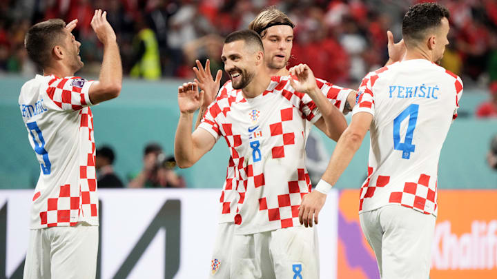 Croatia produced a virtuoso performance against Canada to leave them in a strong position in Group F Croatia produced a virtuoso performance against Canada to leave them in a strong position in Group F
