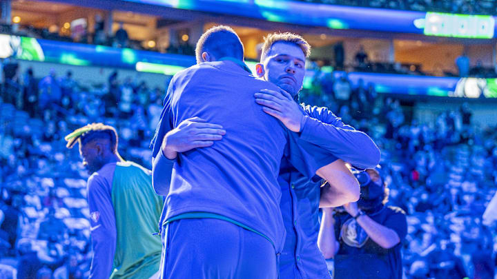Dec 7, 2021; Dallas, Texas, USA; Dallas Mavericks guard Luka Doncic (right) and center Kristaps