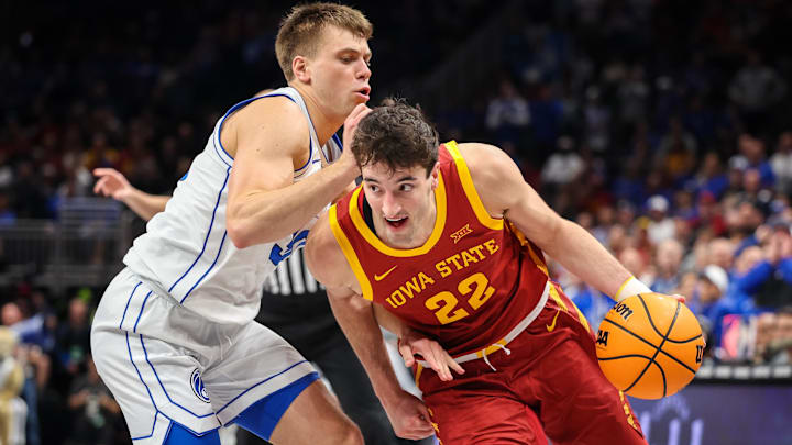 Mar 13, 2025; Kansas City, MO, USA; Iowa State Cyclones forward Milan Momcilovic (22) drives to the basket during the second half against the Brigham Young Cougars at T-Mobile Center.