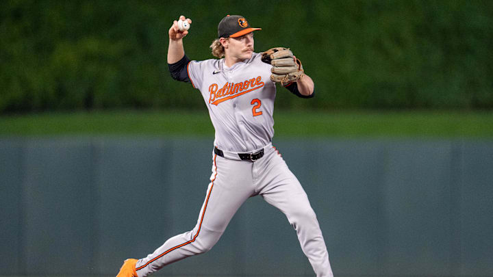 Sep 27, 2024; Minneapolis, Minnesota, USA; Baltimore Orioles shortstop Gunnar Henderson (2) throws out Minnesota Twins shortstop Carlos Correa (4) in the sixth inning at Target Field.