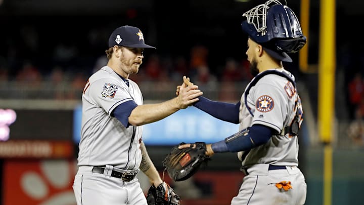 Oct 26, 2019; Washington, DC, USA; Houston Astros catcher Robinson Chirinos (28) and relief pitcher