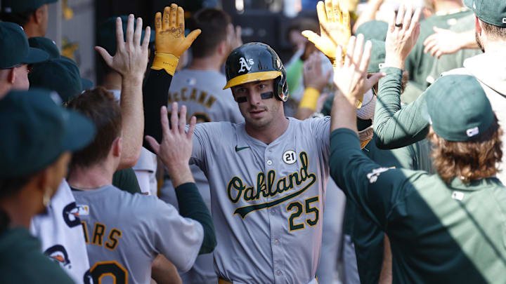 Sep 15, 2024; Chicago, Illinois, USA; Oakland Athletics outfielder Brent Rooker (25) celebrates with teammates after hitting a two-run home run against the Chicago White Sox during the fifth inning at Guaranteed Rate Field. Mandatory Credit: Kamil Krzaczynski-Imagn Images