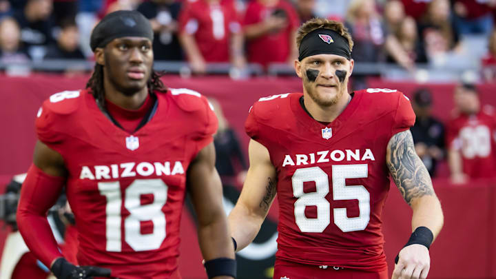 Jan 5, 2025; Glendale, Arizona, USA; Arizona Cardinals wide receiver Marvin Harrison Jr. (18) and tight end Trey McBride (85) against the San Francisco 49ers at State Farm Stadium. Mandatory Credit: Mark J. Rebilas-Imagn Images