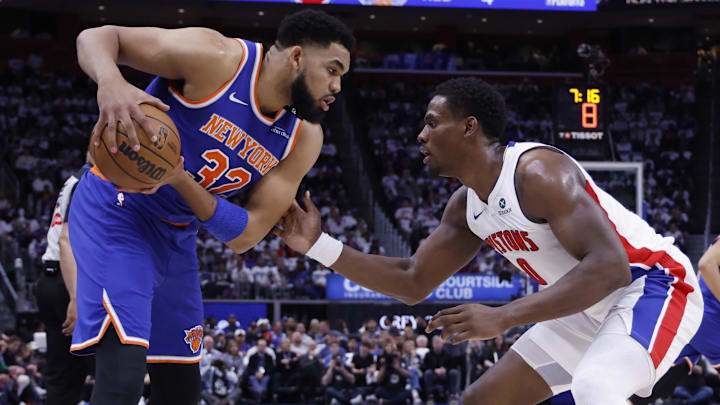 May 1, 2025; Detroit, Michigan, USA; New York Knicks center Karl-Anthony Towns (32) is defended by Detroit Pistons center Jalen Duren (0) in the first half during game six of first round for the 2024 NBA Playoffs at Little Caesars Arena. Mandatory Credit: Rick Osentoski-Imagn Images