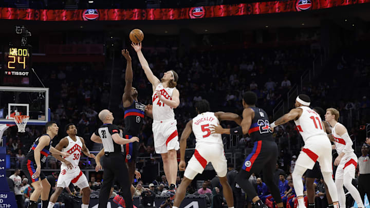 Mar 13, 2024; Detroit, Michigan, USA;  Detroit Pistons center Jalen Duren (0) and Toronto Raptors forward Kelly Olynyk (41) tip off in the first half at Little Caesars Arena. Mandatory Credit: Rick Osentoski-Imagn Images