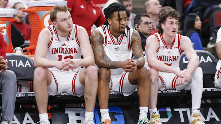 Mar 11, 2026; Chicago, IL, USA; Indiana Hoosiers forward Tucker Devries (12), guard Lamar Wilkerson (3) and guard Conor Enright (5) sit on the bench during the second half at United Center. Mandatory Credit: Kamil Krzaczynski-Imagn Images Mar 11, 2026; Chicago, IL, USA; Indiana Hoosiers forward Tucker Devries (12), guard Lamar Wilkerson (3) and guard Conor Enright (5) sit on the bench during the second half at United Center. Mandatory Credit: Kamil Krzaczynski-Imagn Images