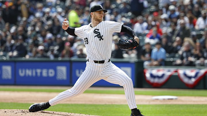Apr 3, 2026; Chicago, Illinois, USA; Chicago White Sox relief pitcher Sean Burke (59) delivers a pitch against the Toronto Blue Jays during the second inning at Rate Field. Mandatory Credit: Kamil Krzaczynski-Imagn Images