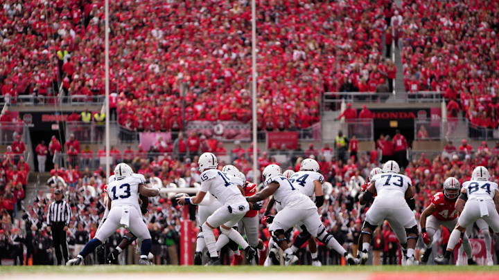 Penn State Nittany Lions quarterback Drew Allar (15) carries the ball against the Ohio State Buckeyes at Ohio Stadium in 2023.