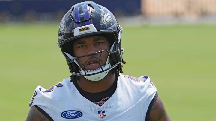 Jul 23, 2025; Owings Mills, MD, USA; Baltimore Ravens linebacker Mike Green (45) warms up during training camp at Under Armour Performance Center. Mandatory Credit: Mitch Stringer-Imagn Images