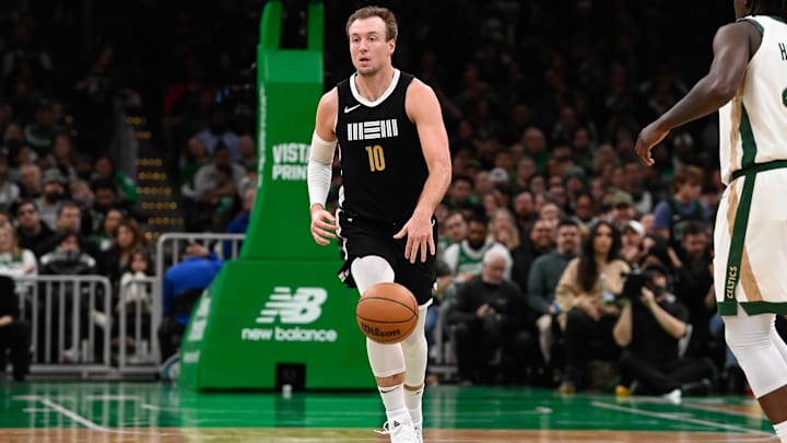 Feb 4, 2024; Boston, Massachusetts, USA; Memphis Grizzlies guard Luke Kennard (10) dribbles the ball during the second half against the Boston Celtics at TD Garden. Mandatory Credit: Eric Canha-USA TODAY Sports