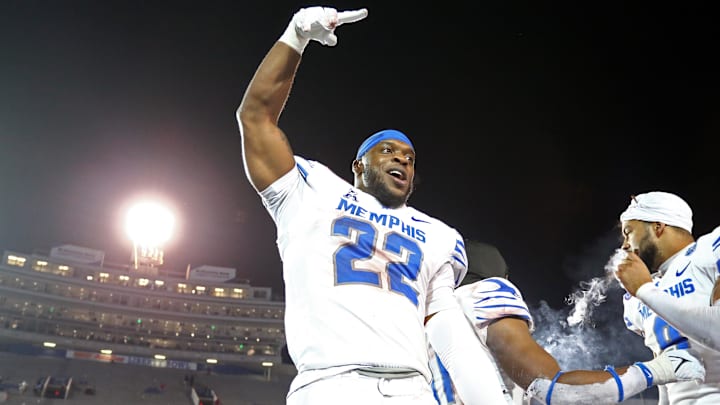 Dec 29, 2023; Memphis, TN, USA; Memphis Tigers defensive linemen Jaylon Allen (22) celebrates after defeating the Iowa State Cyclones in the Liberty Bowl at Simmons Bank Liberty Stadium. Mandatory Credit: Petre Thomas-Imagn Images