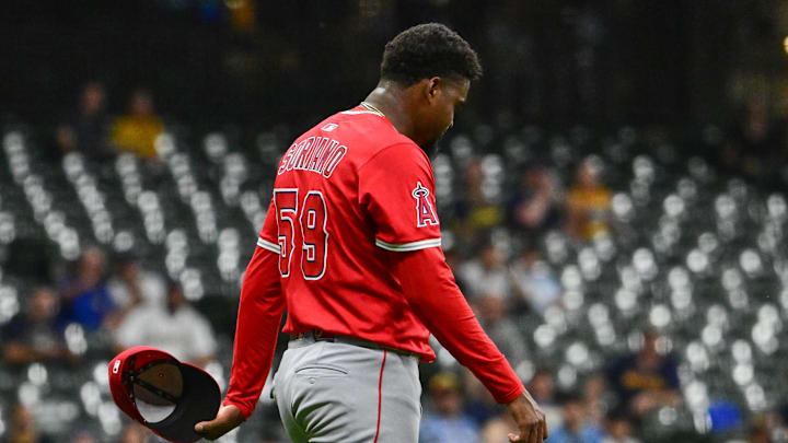 Sep 17, 2025; Milwaukee, Wisconsin, USA; Los Angeles Angels starting pitcher Jose Soriano (59) reacts after getting hit by a ball hit by Milwaukee Brewers first baseman Jake Bauers (not pictured) in the second inning at American Family Field. Mandatory Credit: Benny Sieu-Imagn Images