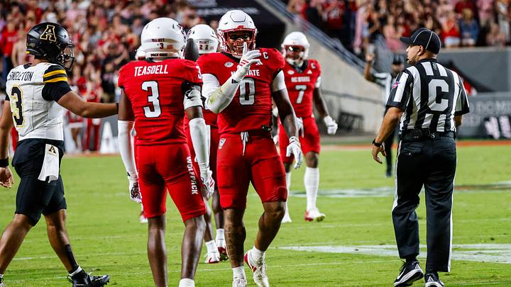 Sep 26, 2026; Raleigh, North Carolina, USA; NC State Wolfpack linebacker Popo Aguirre (0) celebrates his tackle during the first half of the game against App State Mountaineers at Carter-Finley Stadium. Mandatory Credit: Jaylynn Nash-Imagn Images Sep 26, 2026; Raleigh, North Carolina, USA; NC State Wolfpack linebacker Popo Aguirre (0) celebrates his tackle during the first half of the game against App State Mountaineers at Carter-Finley Stadium. Mandatory Credit: Jaylynn Nash-Imagn Images