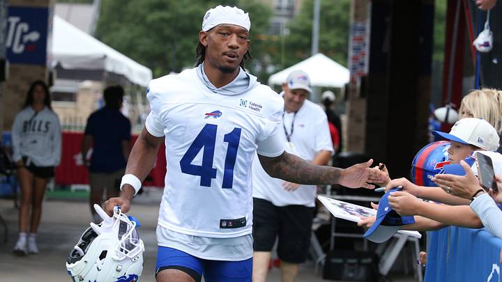 Buffalo Bills rookie defensive back Kani Walker high-fives fans as he takes the field during Day Two of Bills training camp at St. John Fisher University in Pittsford, New York, on Thursday, July 30, 2026. Buffalo Bills rookie defensive back Kani Walker high-fives fans as he takes the field during Day Two of Bills training camp at St. John Fisher University in Pittsford, New York, on Thursday, July 30, 2026.